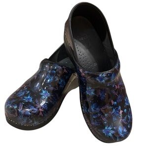 Dansko Women's Professional Clogs in the Night Bloom Patent Leather Design.